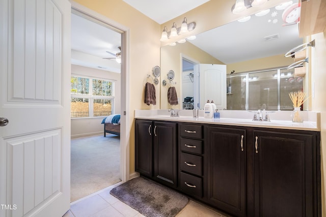 bathroom featuring vanity, ceiling fan, tile patterned floors, and a shower with door