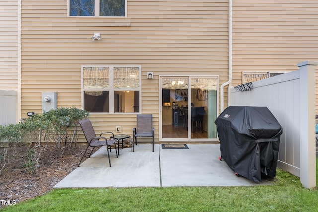 rear view of property featuring a patio