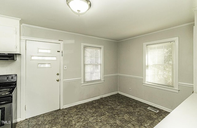 entrance foyer featuring crown molding