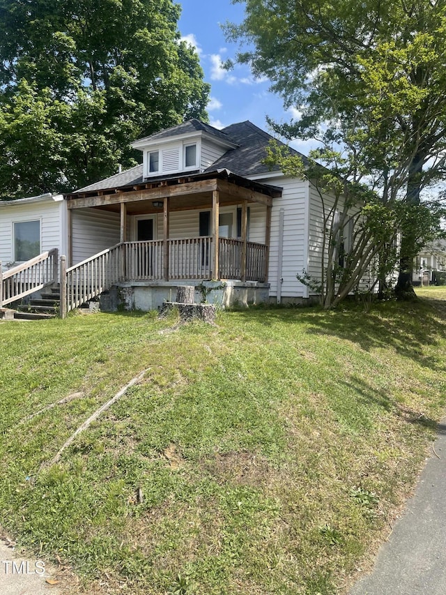 614 Tucker St, Burlington, NC 27215 - bungalow with a porch and a front yard
