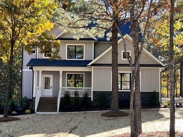 view of front of property featuring covered porch