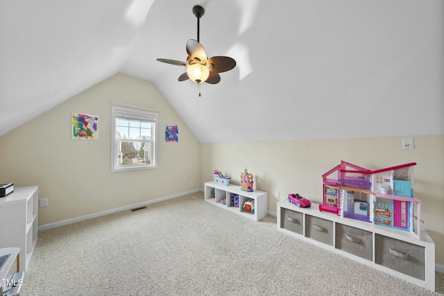 recreation room with vaulted ceiling, carpet floors, and ceiling fan