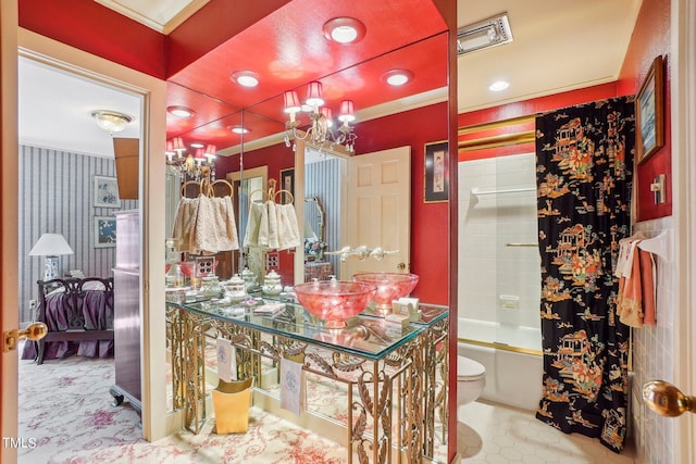 full bathroom featuring sink, toilet, bathtub / shower combination, and crown molding