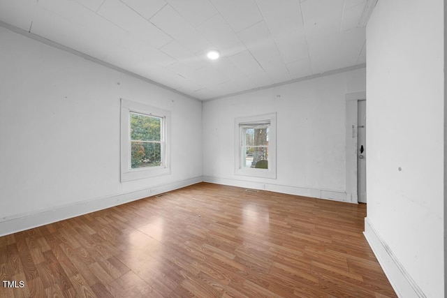 empty room featuring hardwood / wood-style flooring