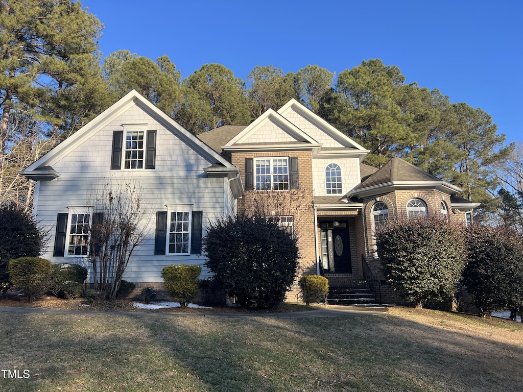 view of front property with a front yard