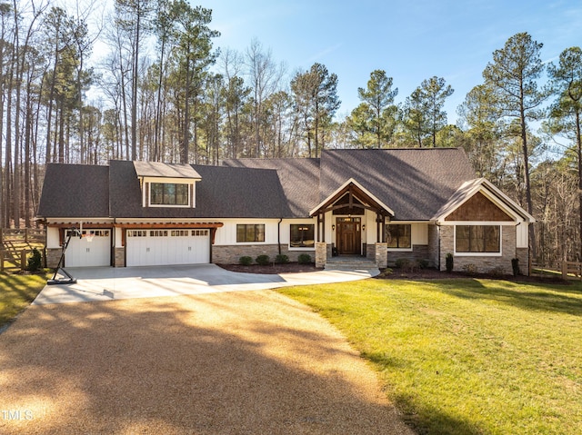 view of front facade featuring a garage and a front lawn