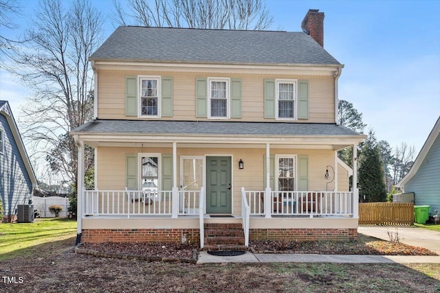 view of front of home featuring cooling unit and covered porch