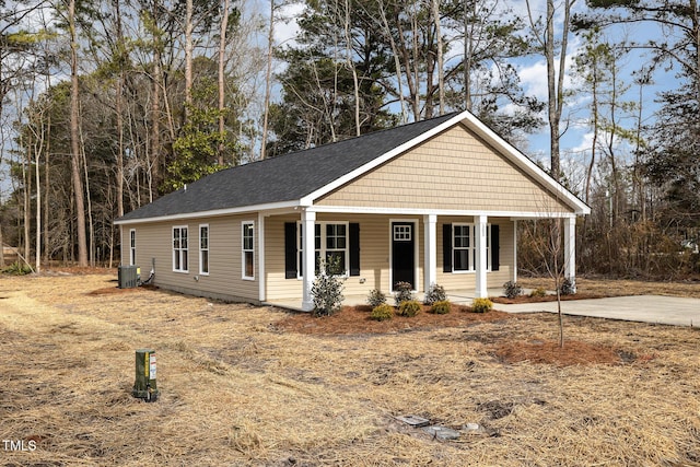 view of front of property featuring central AC unit and covered porch