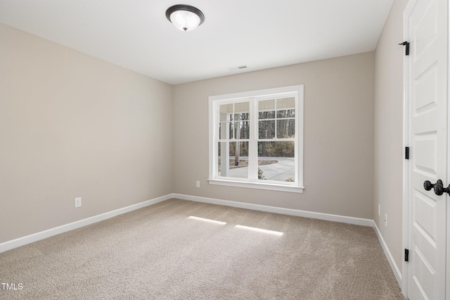 view of carpeted spare room