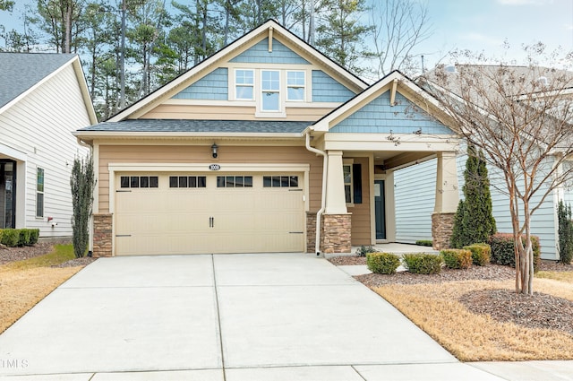 craftsman-style house with a garage