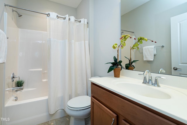 full bathroom with vanity, toilet, and shower / tub combo