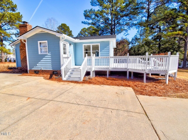 view of front facade with a deck