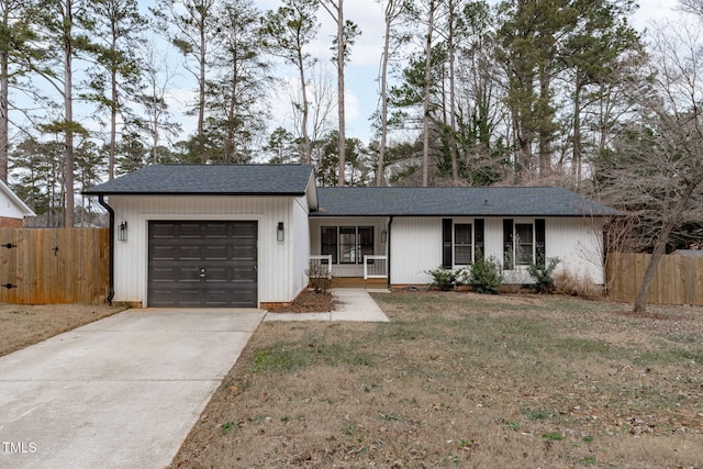 ranch-style home featuring a garage, a front lawn, and a porch