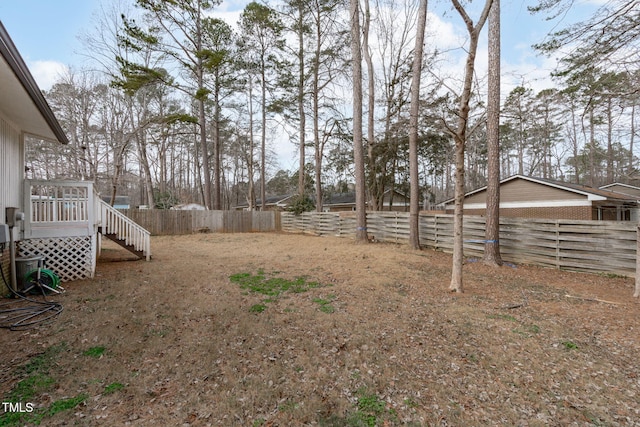 view of yard with a deck