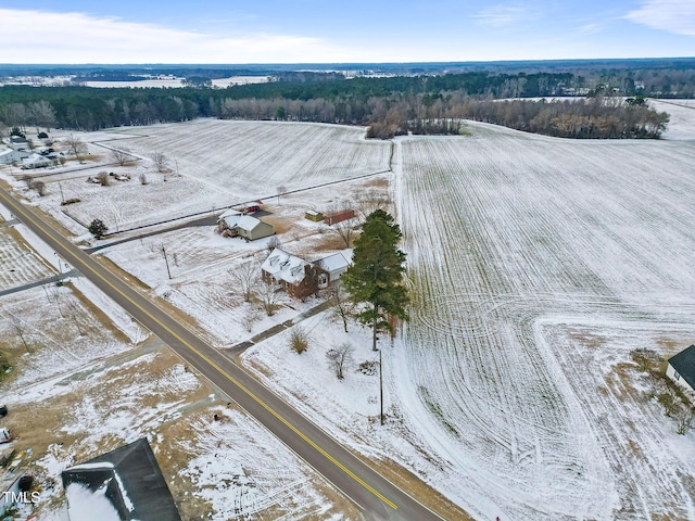 snowy aerial view with a rural view