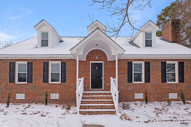 view of new england style home