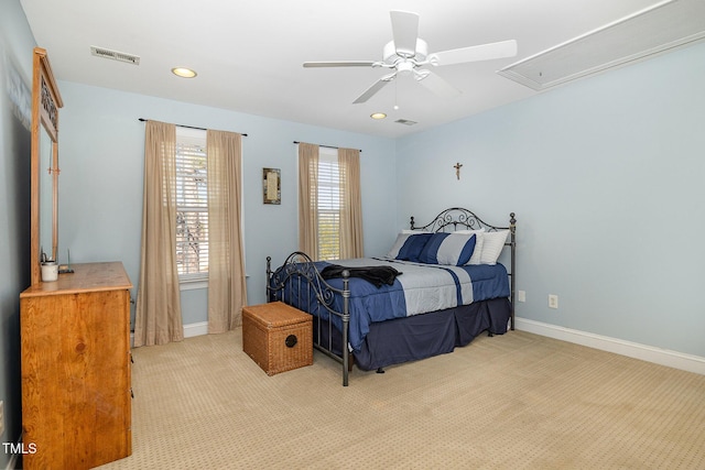 carpeted bedroom with ceiling fan