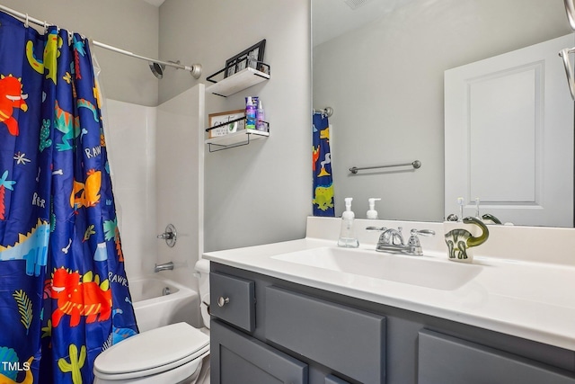 full bathroom with vanity, toilet, and shower / bath combo