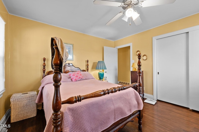 bedroom featuring wood-type flooring, a closet, and ceiling fan