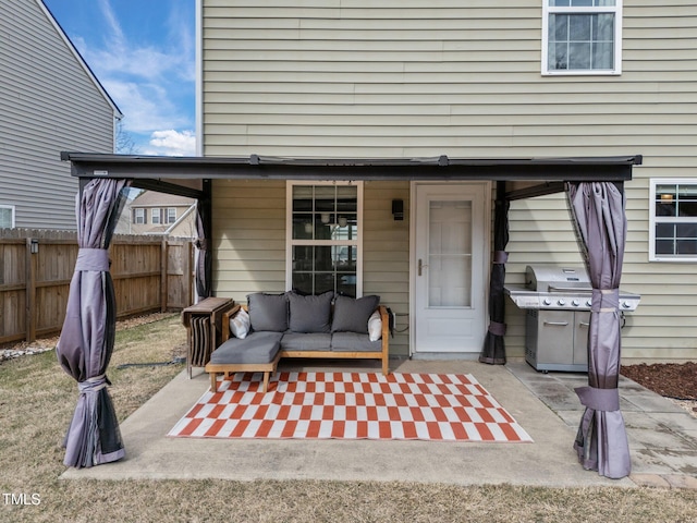 view of patio with a grill and an outdoor hangout area