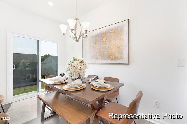 dining room featuring a notable chandelier and a wealth of natural light