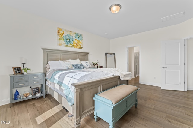 bedroom featuring hardwood / wood-style floors