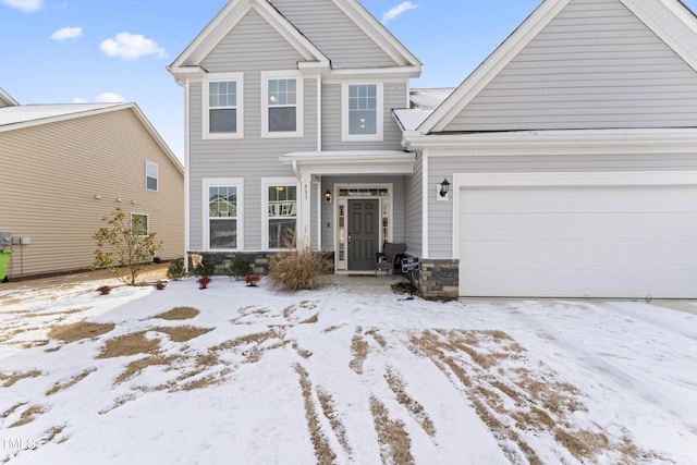 view of front of property featuring a garage