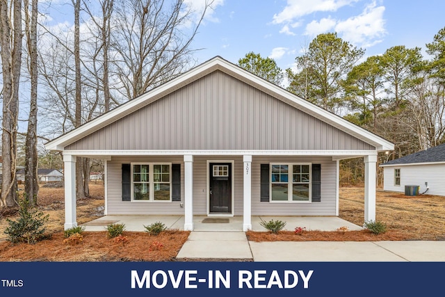 view of front of house featuring central AC unit and covered porch