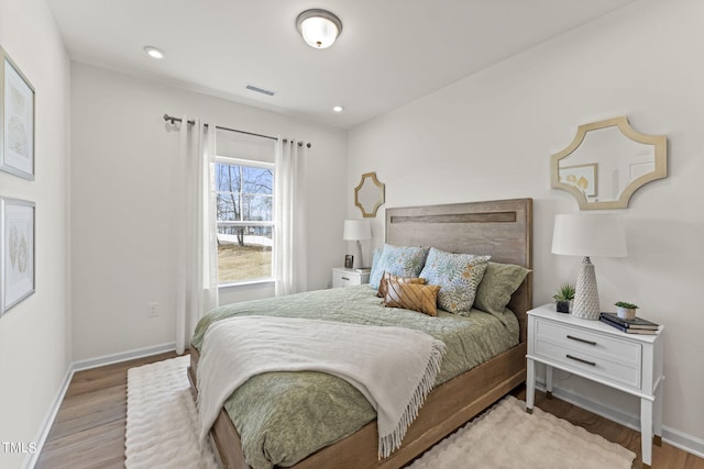 bedroom featuring light wood-type flooring