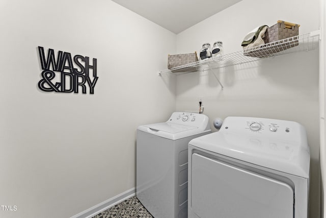 laundry room featuring separate washer and dryer