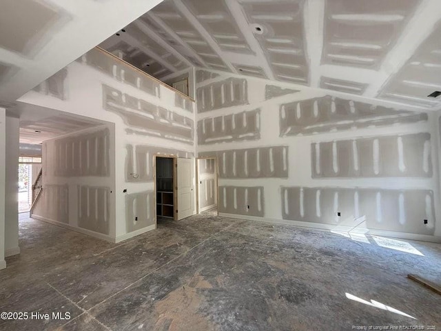 199 Pinecrest Dr, Carthage, NC 28327 - unfurnished living room with lofted ceiling