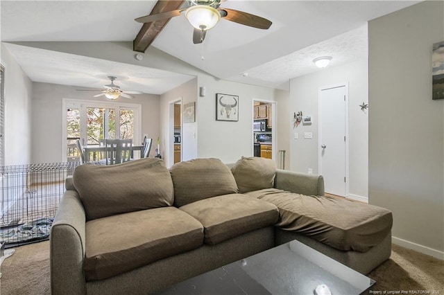 carpeted living room with ceiling fan and vaulted ceiling with beams