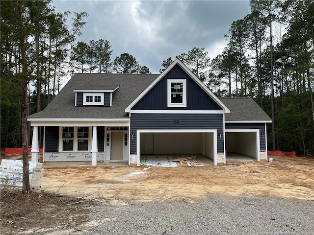 181 Pinecrest Dr, Carthage, NC 28327 - view of front of home with covered porch and roof with shingles