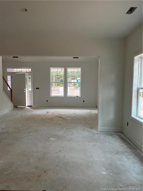 181 Pinecrest Dr, Carthage, NC 28327 - unfurnished living room featuring baseboards