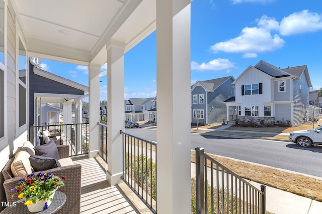 balcony featuring a residential view