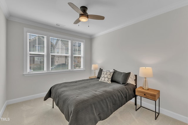 bedroom with visible vents, crown molding, ceiling fan, carpet, and baseboards