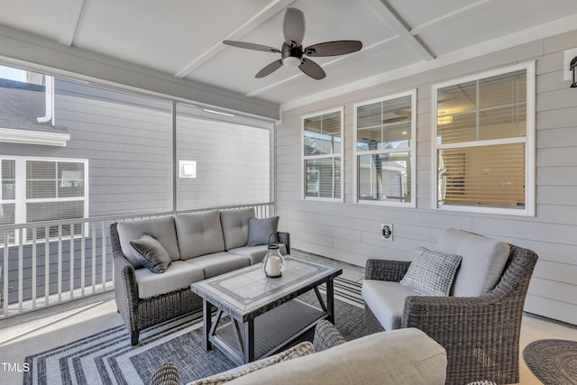 view of patio with outdoor lounge area and a ceiling fan