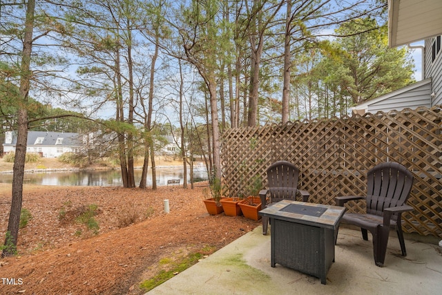 view of patio / terrace featuring a water view