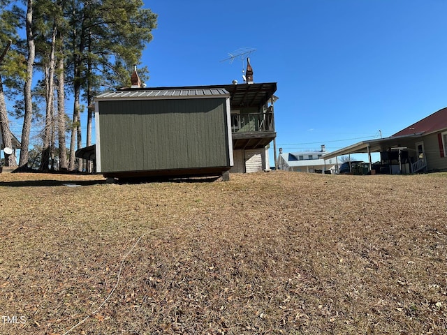 view of home's exterior featuring a yard