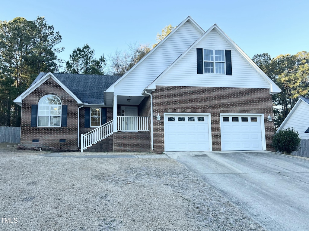 view of front of property with a garage