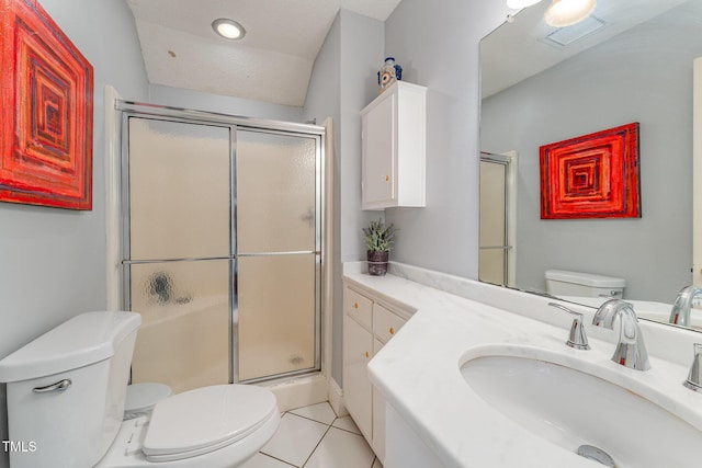 bathroom featuring vanity, a stall shower, tile patterned floors, toilet, and visible vents