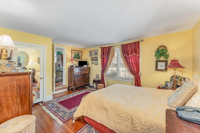 bedroom featuring wood finished floors