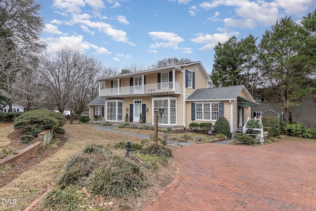 view of property with a balcony