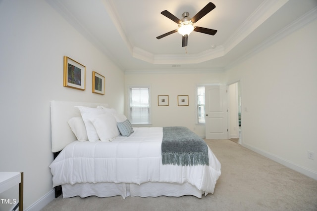 978 Bonanza Ln Unit 163, Mebane, NC 27302 - bedroom featuring ceiling fan, ornamental molding, a tray ceiling, and light carpet