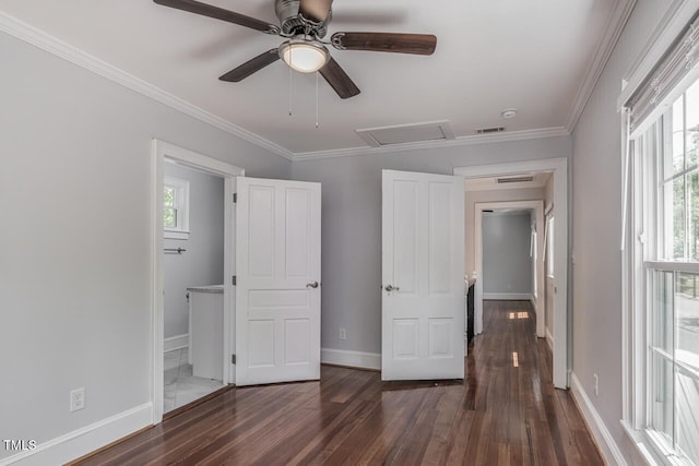 unfurnished bedroom featuring ceiling fan, ornamental molding, and dark hardwood / wood-style floors