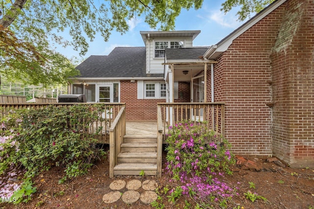801 Williamsboro St, Oxford, NC 27565 - back of house featuring brick siding, a wooden deck, and a shingled roof