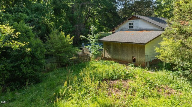 801 Williamsboro St, Oxford, NC 27565 - view of outdoor structure with fence and a view of trees