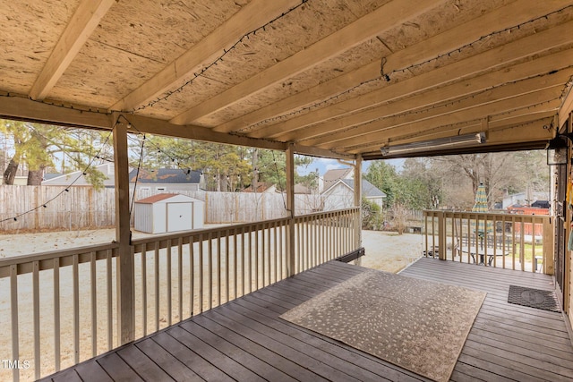 deck featuring a storage unit