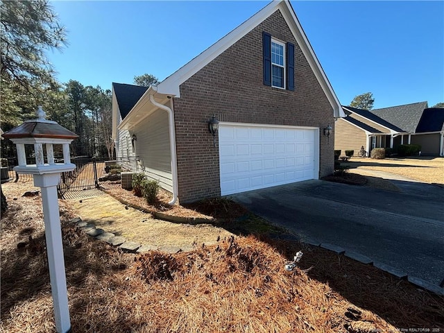 view of property exterior with a garage