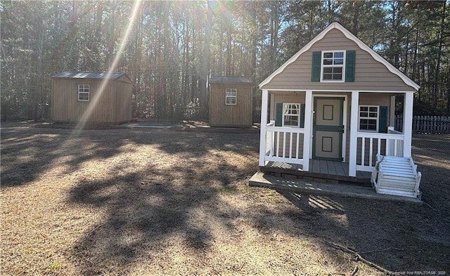 exterior space featuring a shed